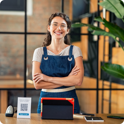 Smiling person on a desk